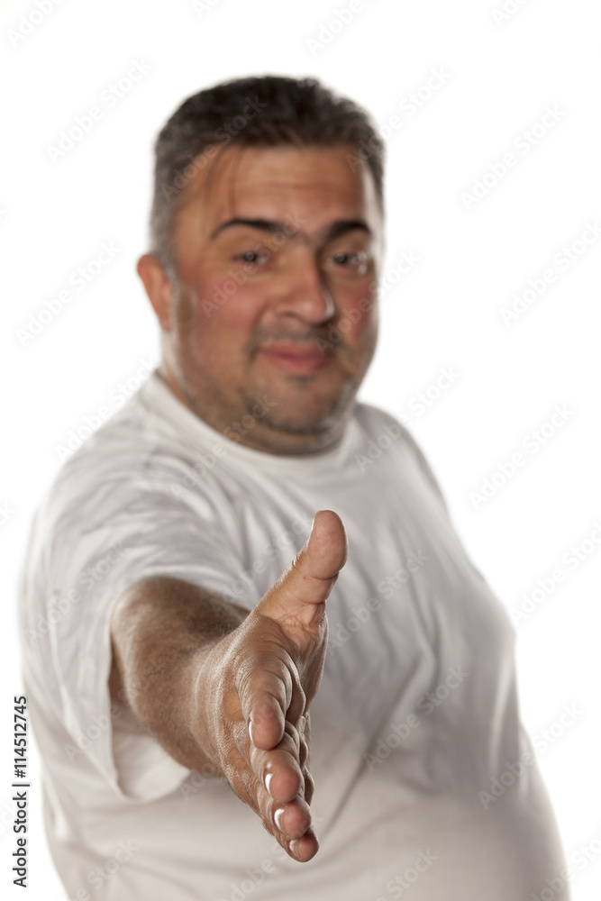 smiling man gives hand for handshake smiling man gives hand for handshake