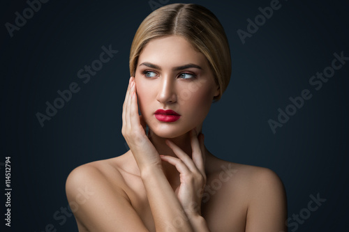 Portrait of blonde girl with red lips