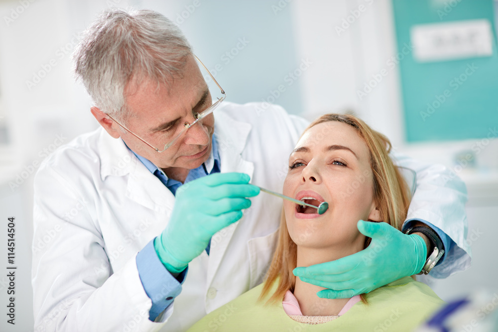 Fototapeta premium Woman on dental check up