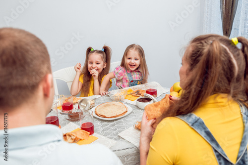 Cheerful family having lunch