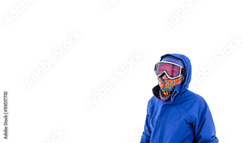 Portrait of a snowboarder isolated in sunglasses mask at snow storm
