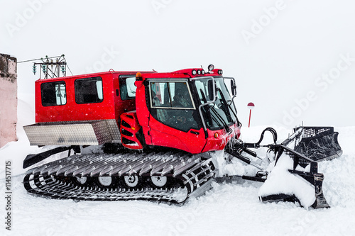 Canvas Print Snowcat at ski resort Elbrus after strong snow blizzard