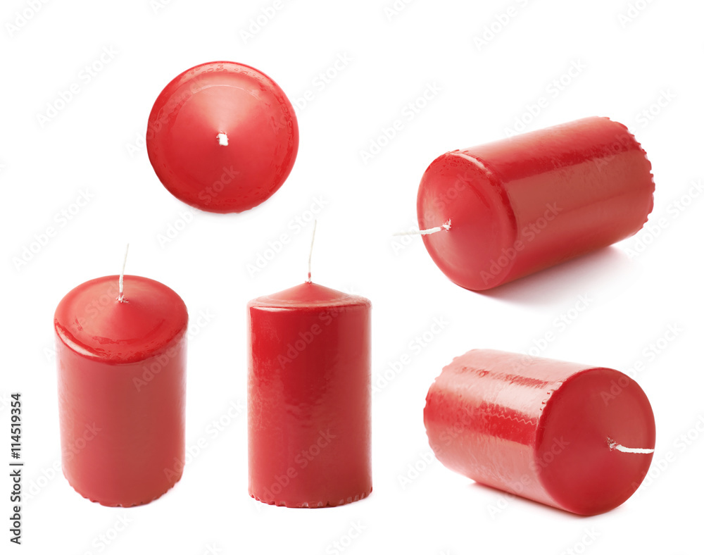 Unused red wax candle isolated