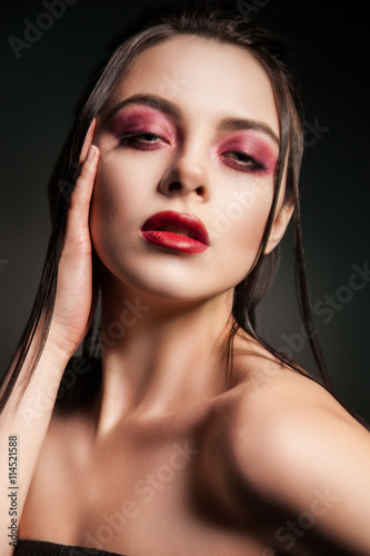 Close-up of beautiful model with bright makeup