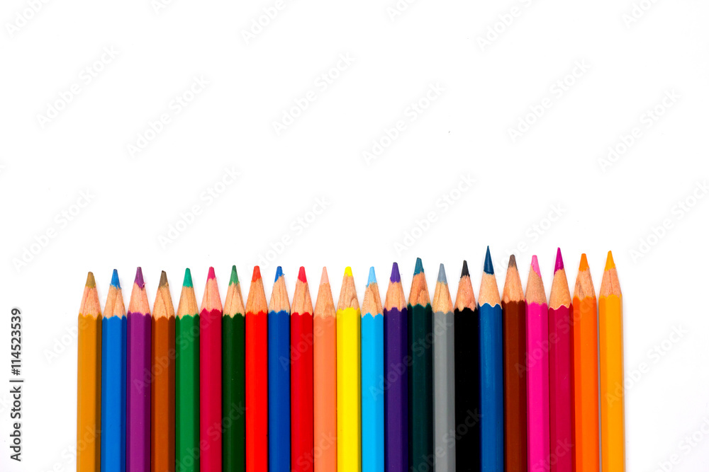 Row of color pencil placed on white background Row of color pencil placed on white background