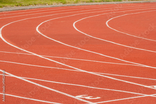 Running track in stadium, close-up, backgraund