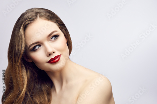 Red lips girl looking to right and smile