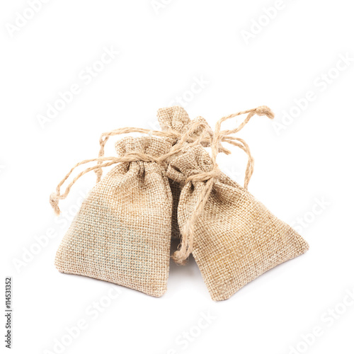 Tiny sackcloth bag isolated
