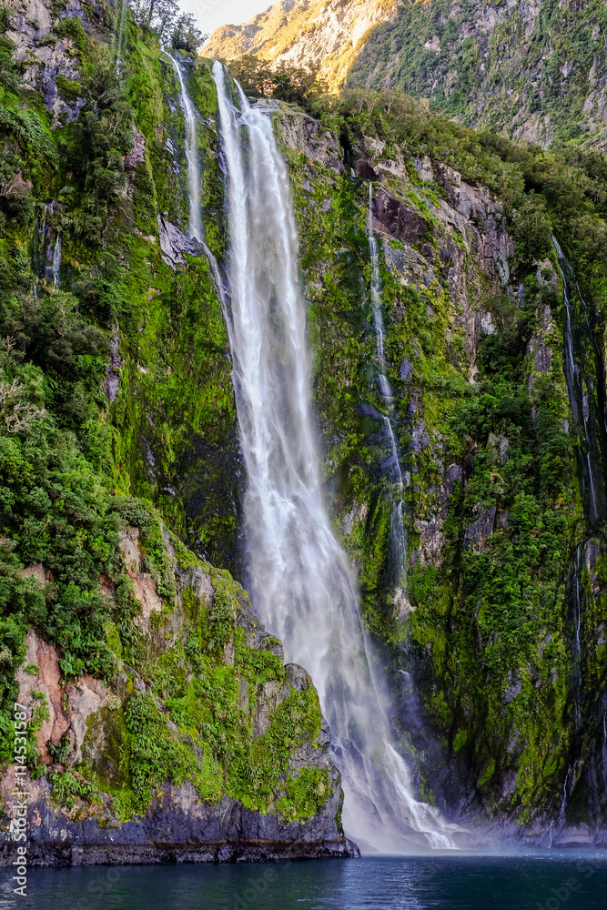 A narrow waterfall at Milford Sound, New Zealand