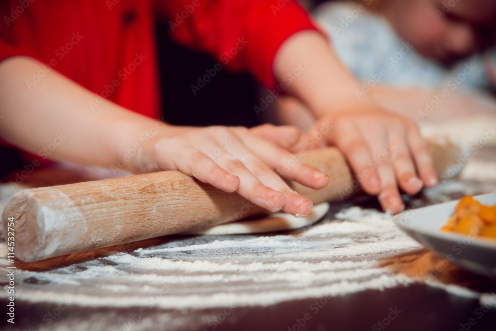 Children make pizza at home Children make pizza at home