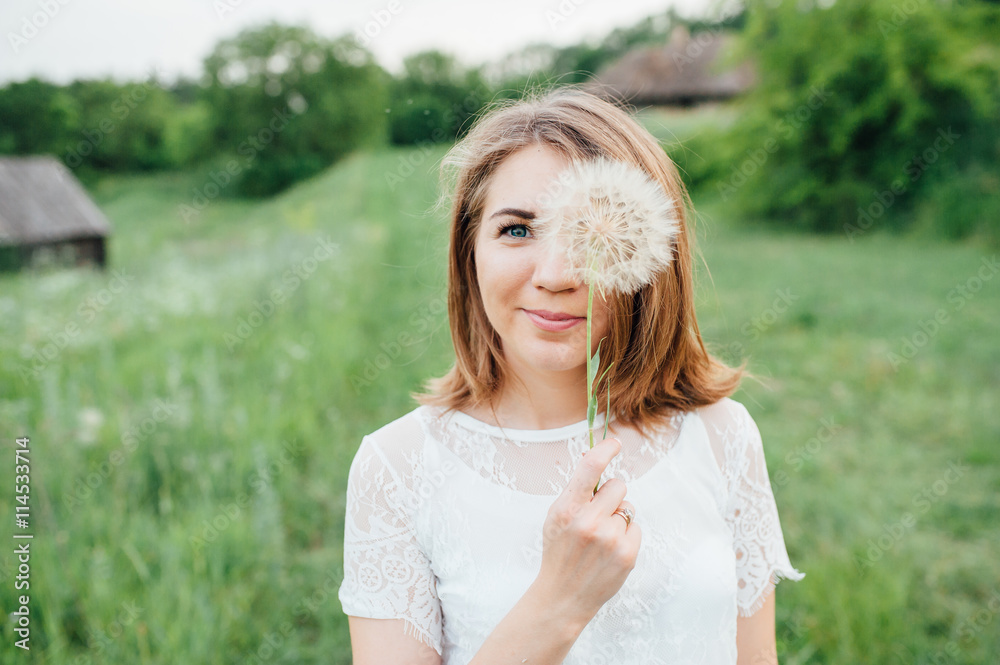 beautiful girl in white dress lies in green grass beautiful girl in white dress lies in green grass