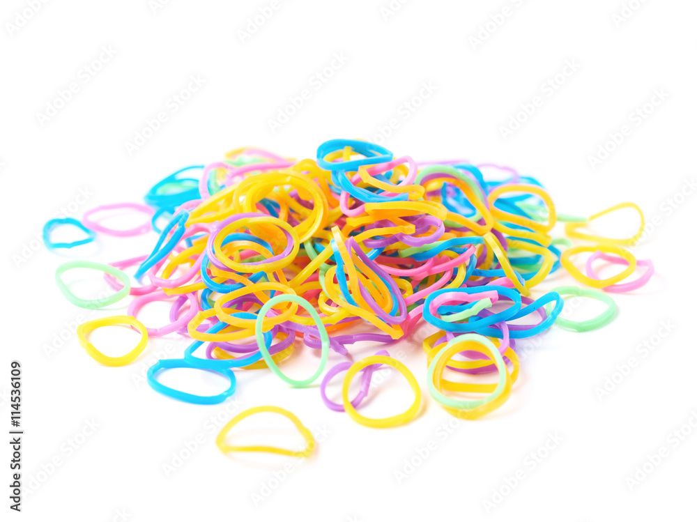 Fototapeta premium Pile of multiple loom bands isolated
