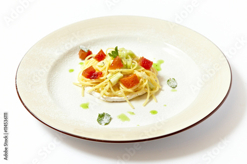 Sweat pasta nests with fruits isolated on white