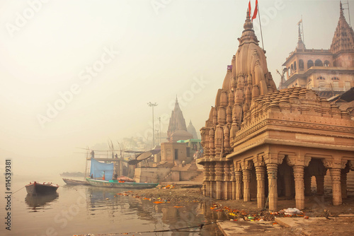 Early morning at Ganges river near flooded temple