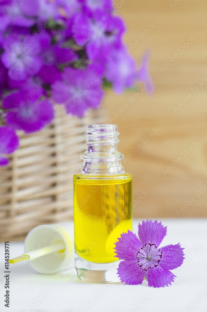 Small bottle of natural cosmetic (essential) aroma oil Small bottle of natural cosmetic (essential) aroma oil