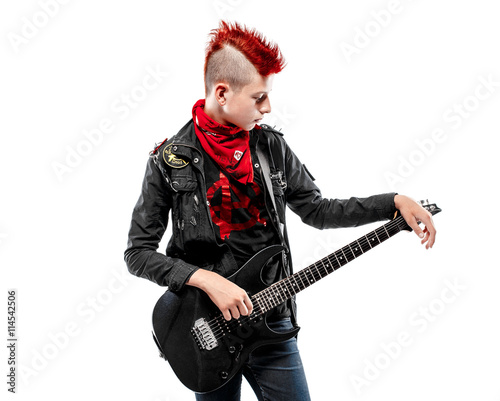 Portrait of teen boy with red haired Mohawk and guitar in leather jacket.Isolated.