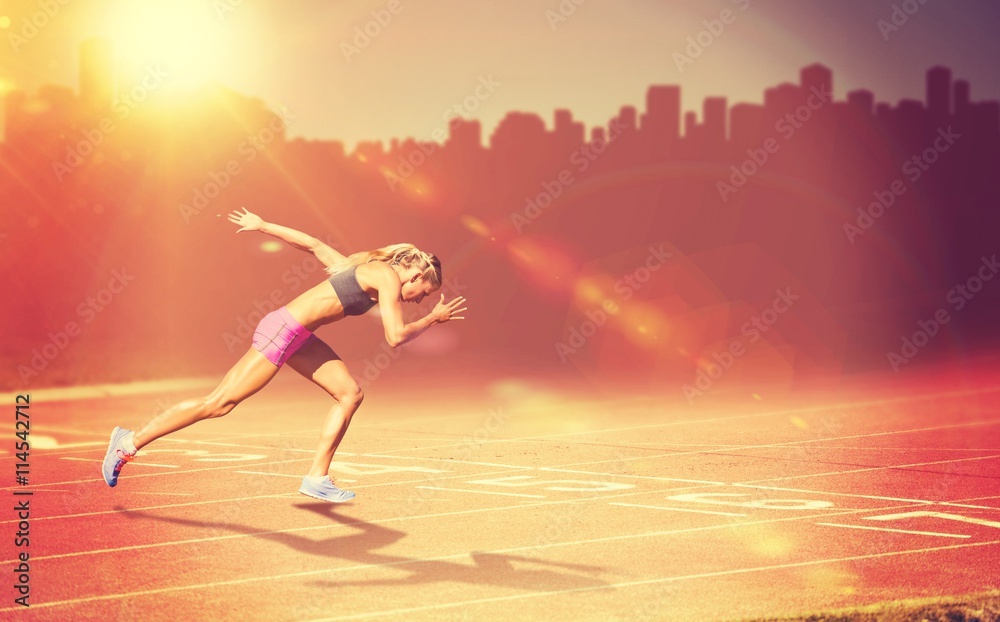 Composite image of sporty woman running on a white background