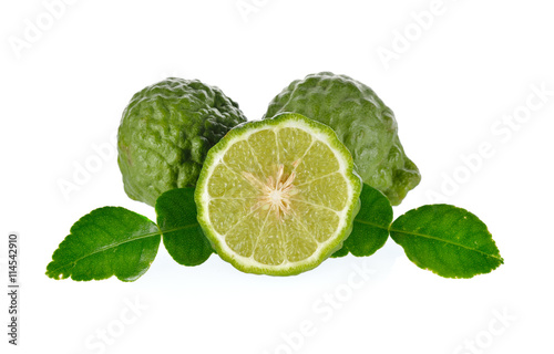 whole and half cut Bergamot with lime leaf on the white backgrou
