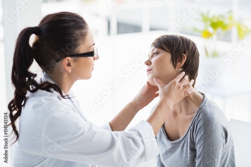 Doctor examining patient