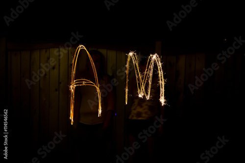 The word Am in sparklers time lapse photography © Click Images