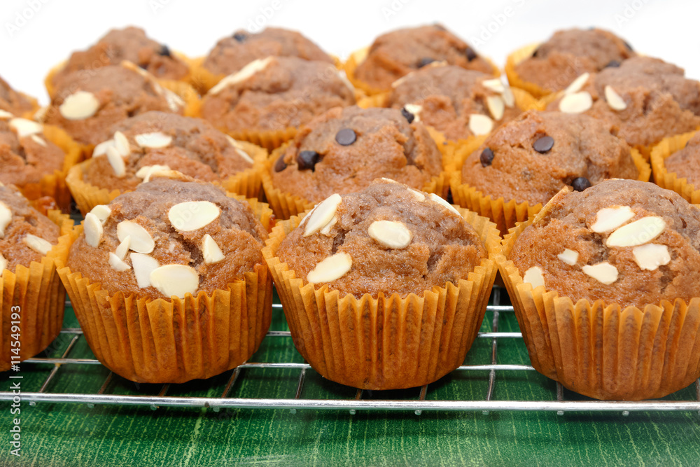 Banana muffins or cupcake on the wooden table Banana muffins or cupcake on the wooden table