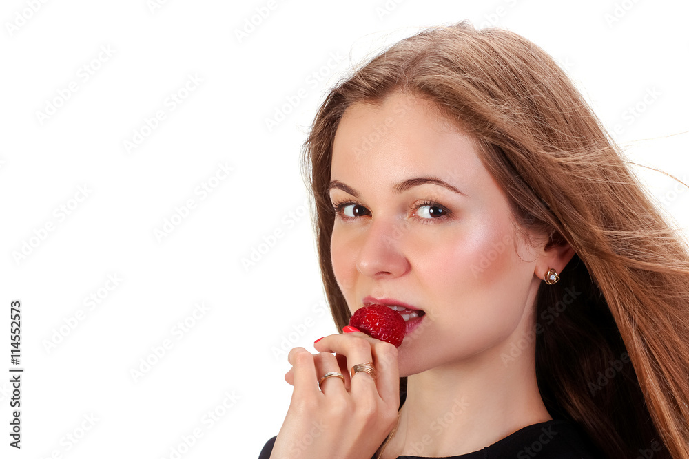 Pretty woman with strawberry in hand isolated on white Pretty woman with strawberry in hand isolated on white