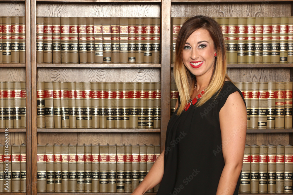 Portrait of a female lawyer inside law office.
Woman in business, business woman.
