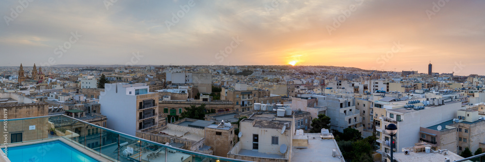 sunset over Malta town in Mediterranean