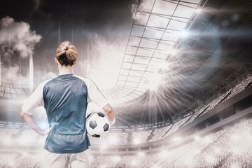 Composite image of rear view of woman football player posing 