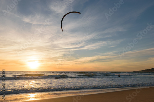 Kitesurfer at sunset in Tarifa, Spain © Julian Schaldach