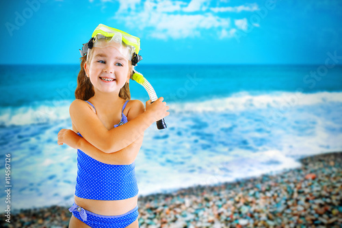 Happy little girl in blue s...