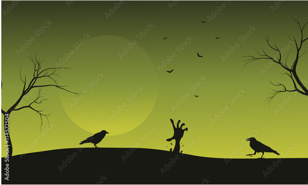 Halloween crow and hand zombie silhouette