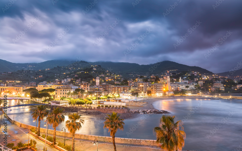 Town & beach of Ventimiglia in northern Italy at night