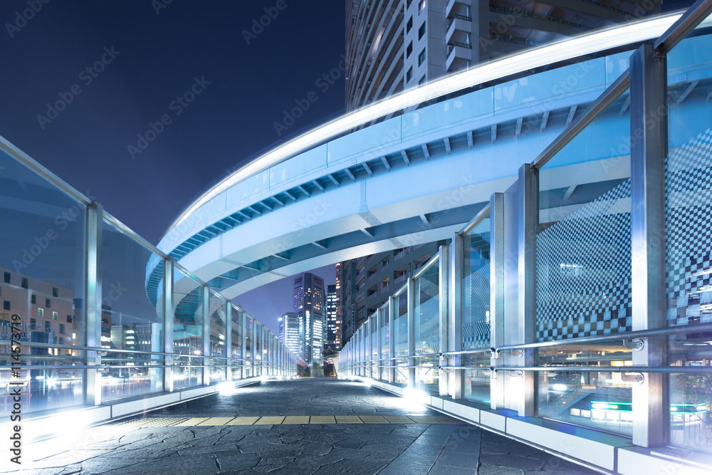 Fototapeta premium modern office buildings in downtown of tokyo at night