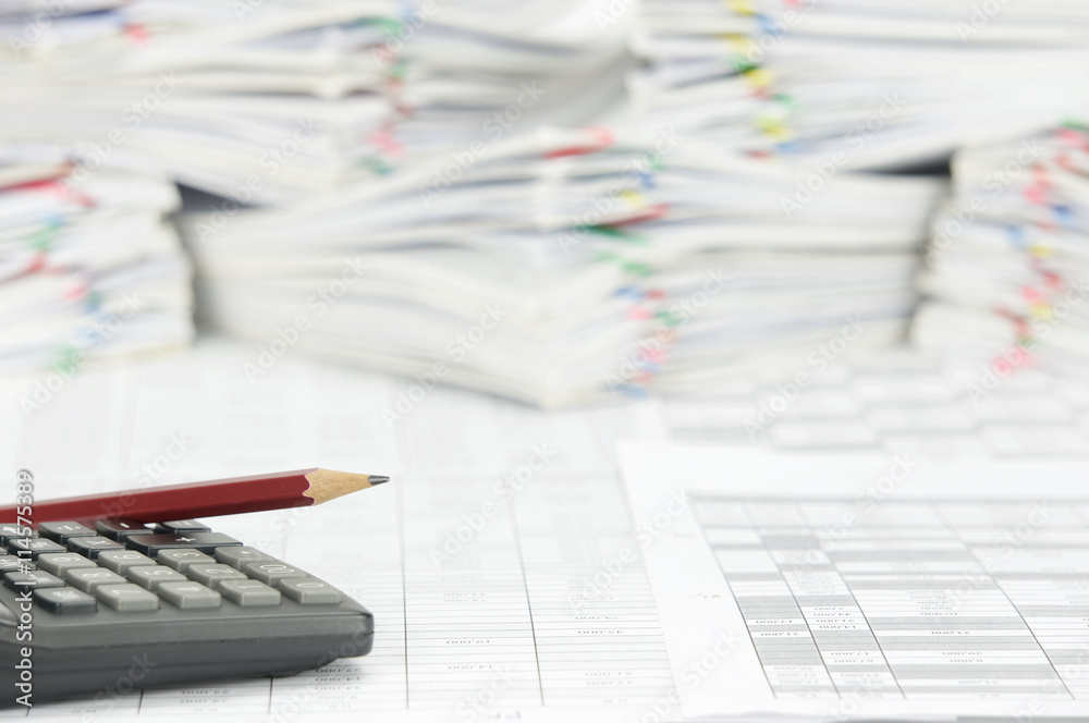 Pencil place on calculator with finance account Pencil place on calculator with finance account