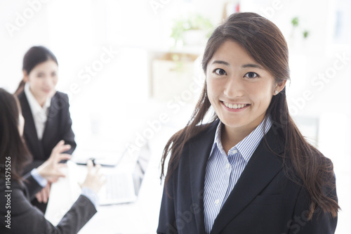 Portrait of business Asian woman wearing a suit