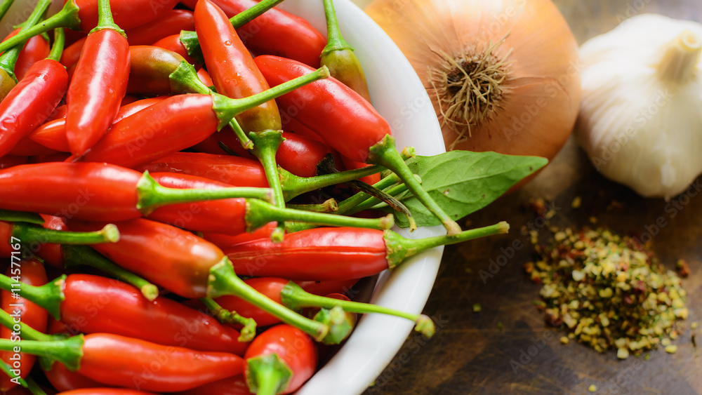 Fresh herbs and spices on a chopping board. Fresh herbs and spices on a chopping board.