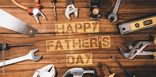 Happy fathers day message surrounded by tools