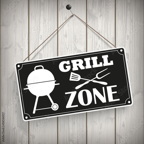 Grillzone - Schild an einer Holzwand
