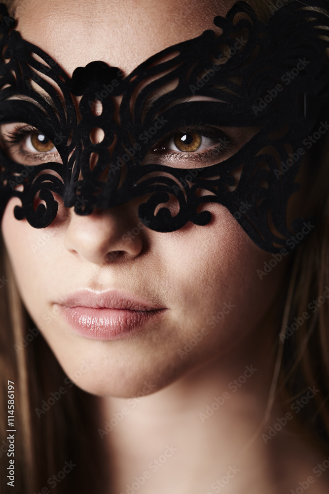 Beautiful woman in mask, close up Beautiful woman in mask, close up
