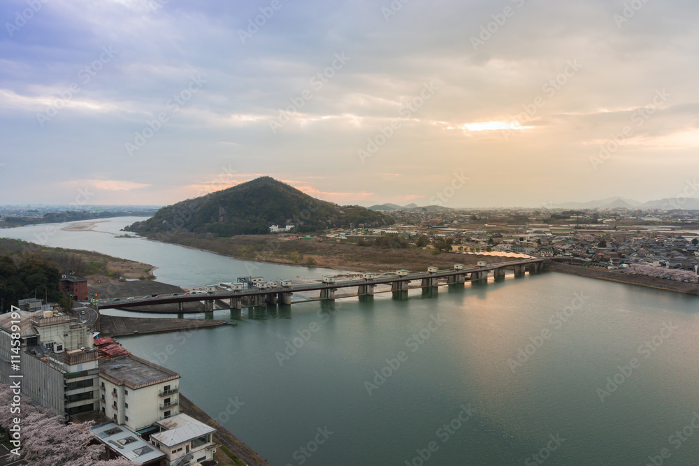 Landscape of inuyama city view with mountain and kiso river at s