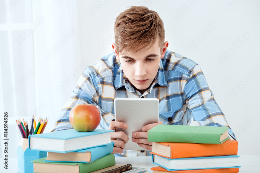 Cute student using tablet computer Cute student using tablet computer