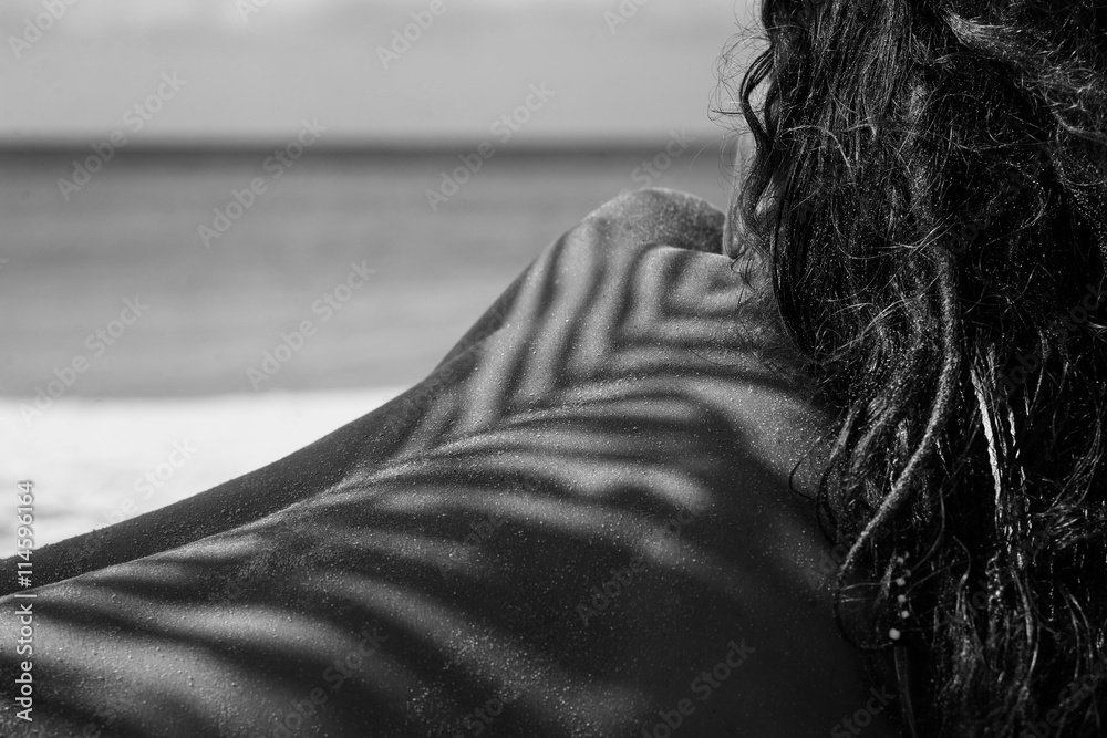 © zolotareva_elina - close up of atrractive young girl lying on the beach with shadow © zolotareva_elina - close up of atrractive young girl lying on the beach with shadow