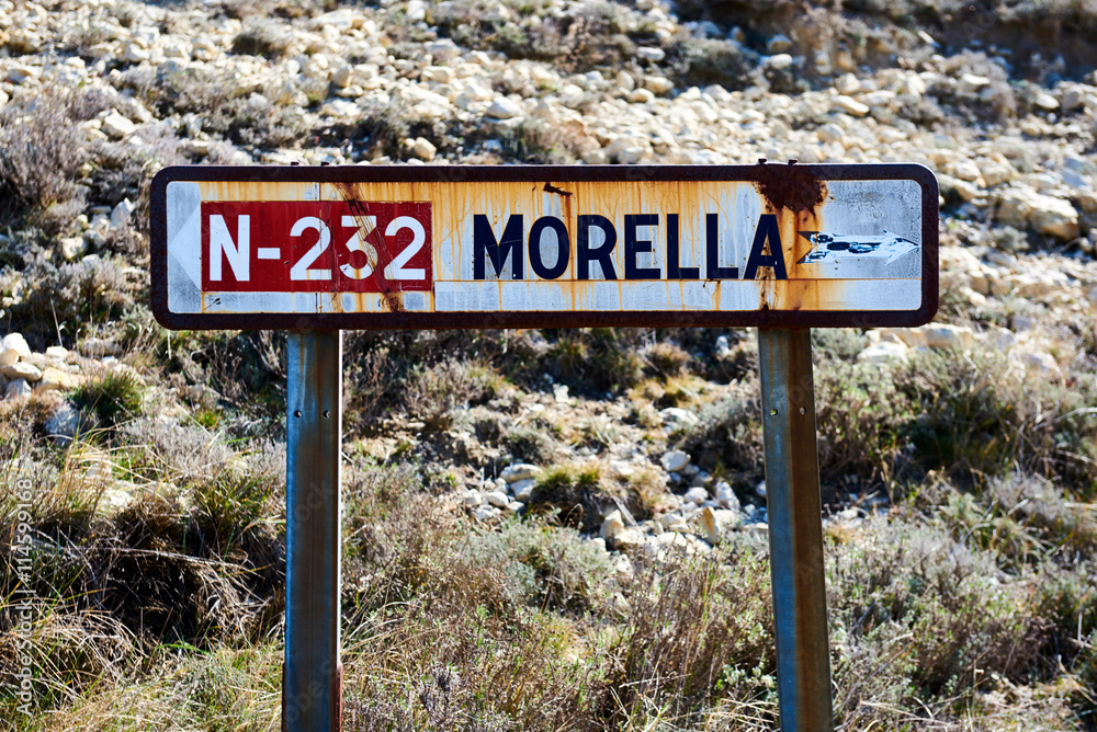 Obraz premium Old road sign of Morrela village. Spain