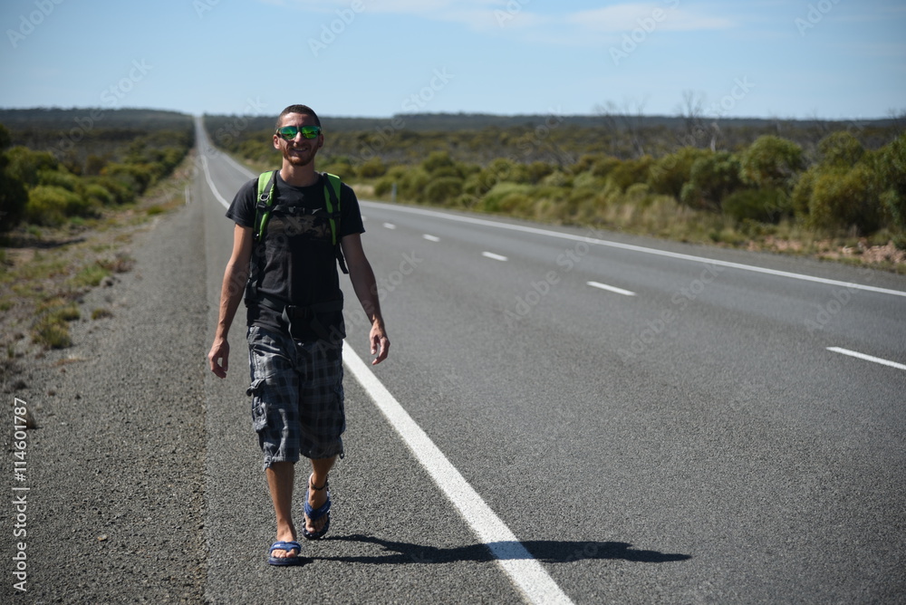 Fototapeta premium backpacker boy on road trip - Australia