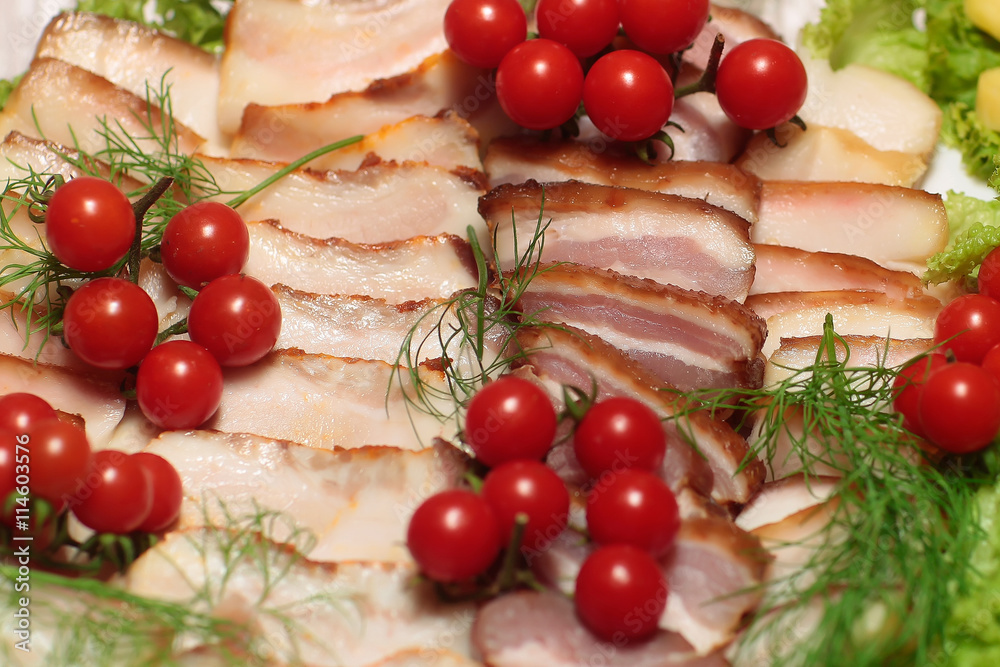 Salted bacon on plate Salted bacon on plate