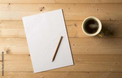 blank sheet with pencil and cup of coffee 