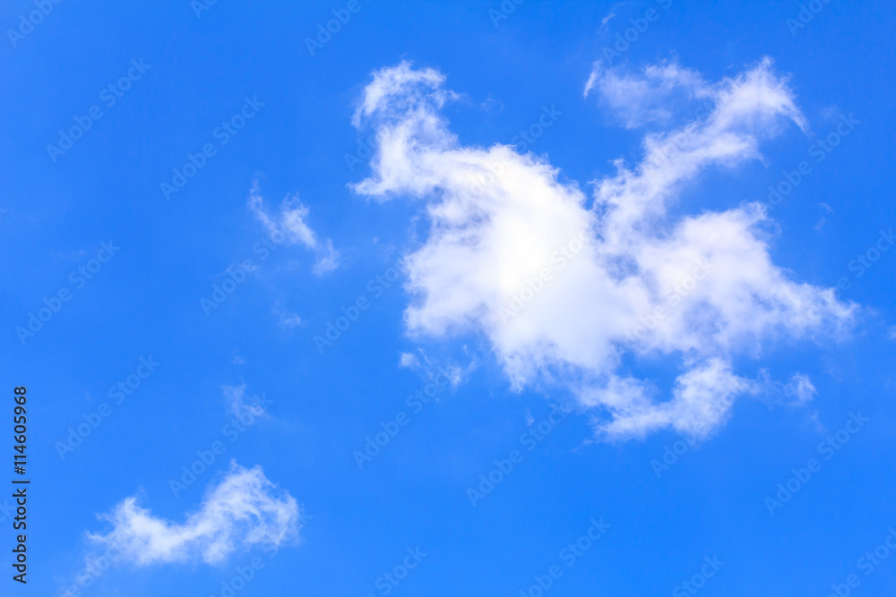 Blue sky background with white clouds. The vast blue sky and clouds sky on sunny day. White fluffy clouds in the blue sky. beautiful clouds and blue sky.