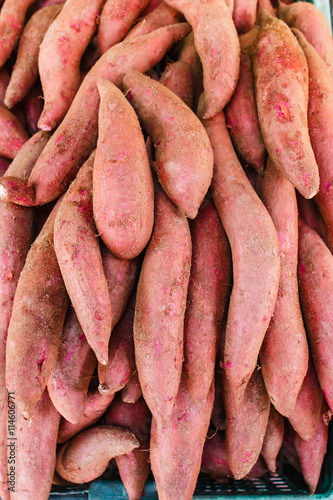 Raw sweet potatoes, sweet potato in the market.