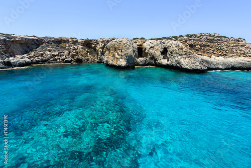 Pirate bay in protaras paralimni, immaculate water, blue sea and rocks, cyprus island photo